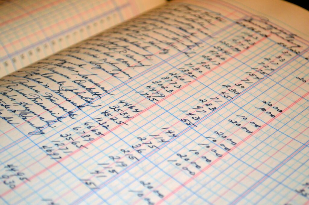 Bookeeping Close up photo of ledgers list